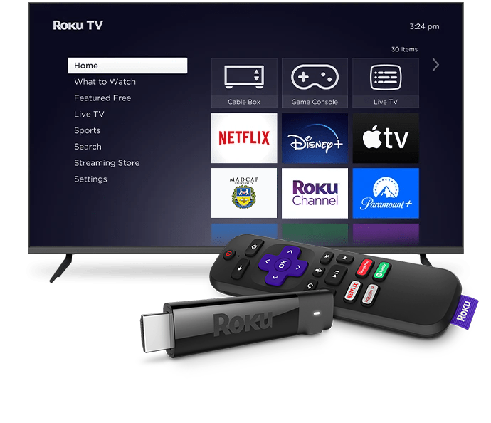 A Roku TV showing the Roku home screen with the Madcap University channel, in front of a Roku remote and streaming stick